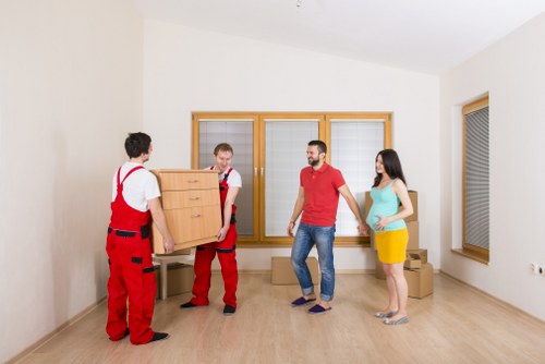 Professional movers handling a flat move in Alperton with care