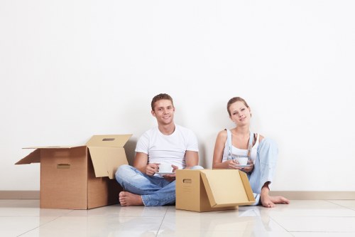 Packed office boxes and furniture prepared for storage