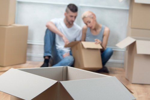 Local team moving business equipment in northwest London