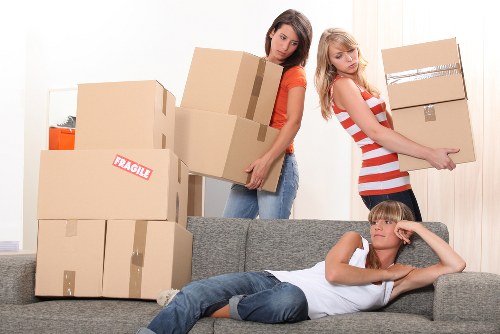 Packed boxes and furniture ready for local removals in Alperton